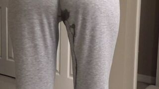 PISSING HER PANTS!!! HOT MILF CAN'T HOLD HER PEE!!!