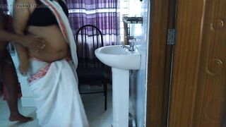 Naked Student came and fucked Indian college female teacher while fixing saree in washroom - huge ass fuck