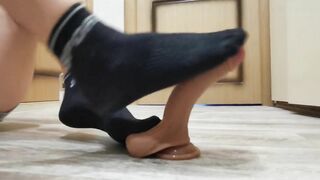Footjob in black socks