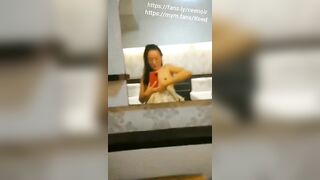 Hot Asian girl in hotel room