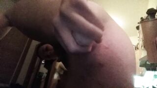 Stuffing dildo up my asshole standing