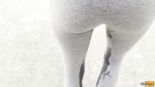 Filmed a crazy girl wetting her leggings in public