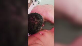 Me licking my wife in a bathtub... sucking her feet.