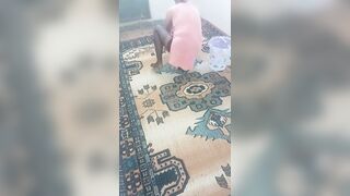 Hot mature wiping the carpet by bending over